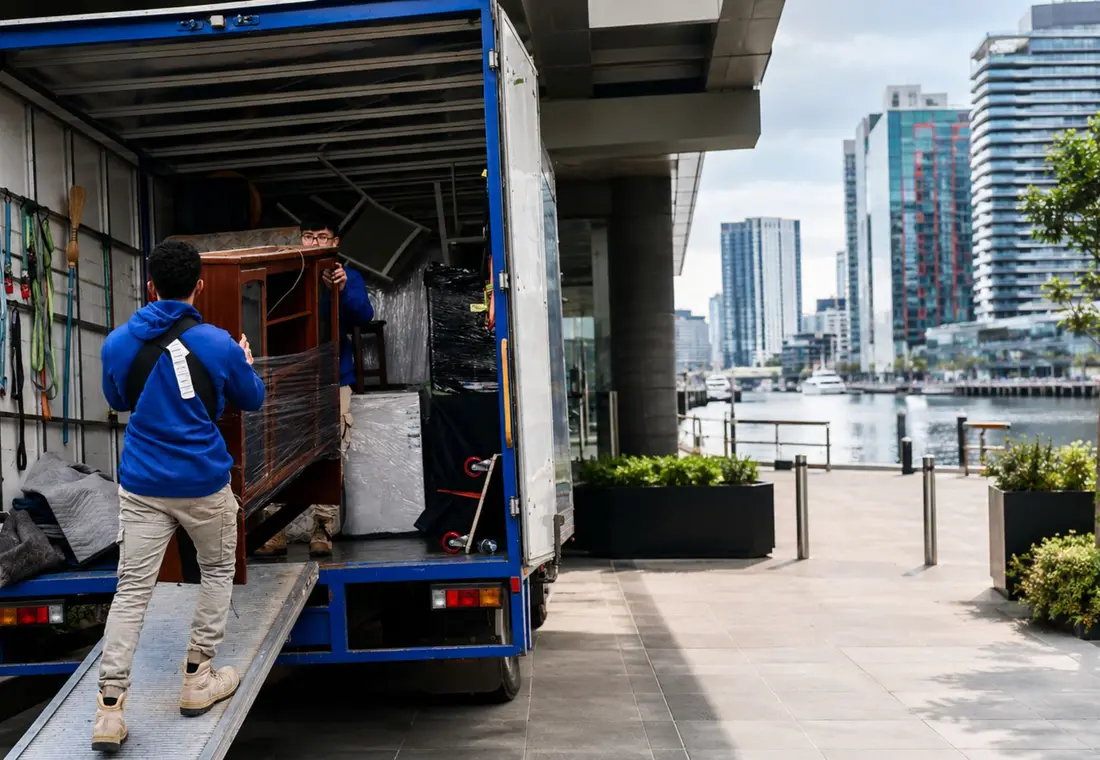 Removalists working beside a truck on the Melbourne Docklands waterfront